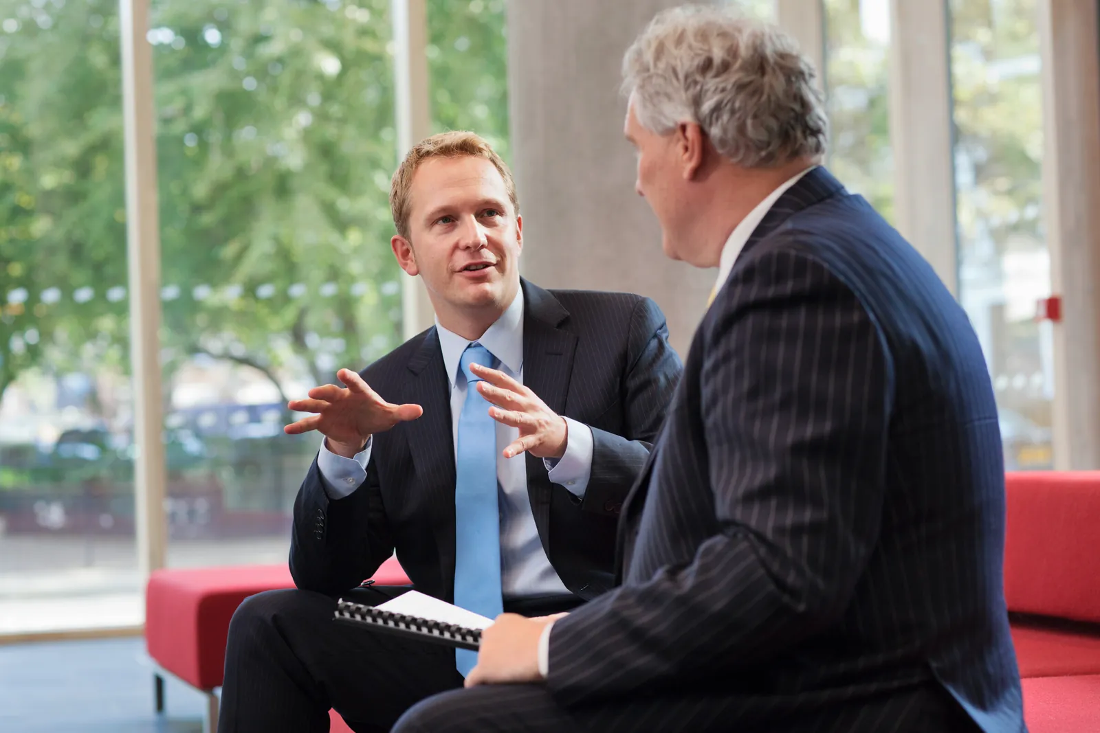 A business owner and a coach in a first conversation